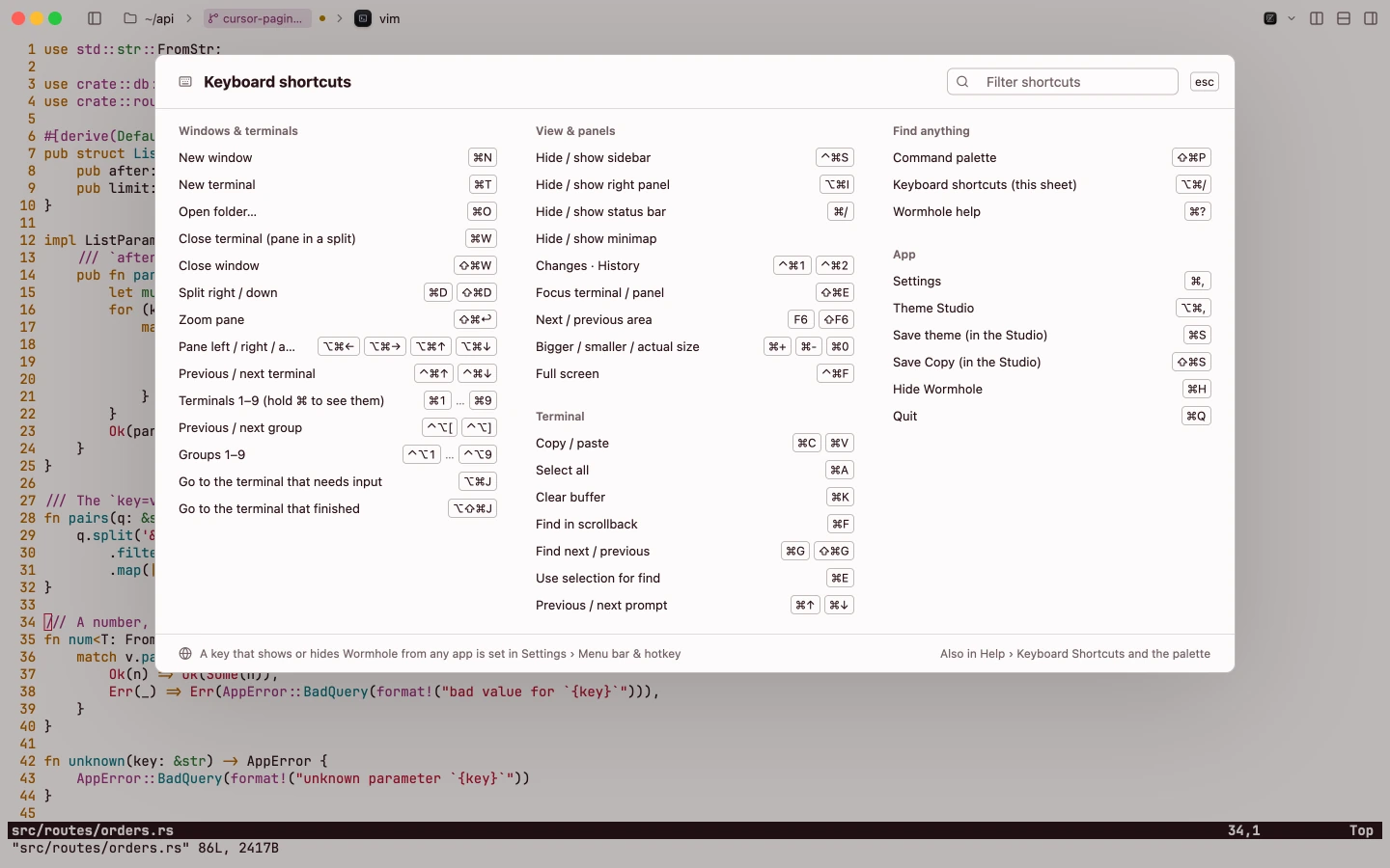 The keyboard shortcuts sheet over vim, in sections: windows and terminals, view and panels, terminal, find anything and app.